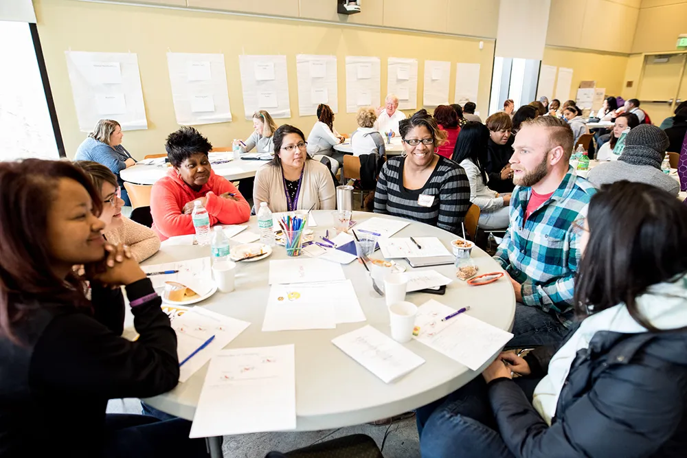 Nonprofit leaders engaging in conversation.